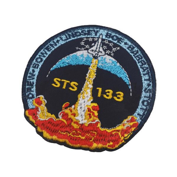 Écusson  STS 133