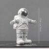figurine astronaute jouet argent