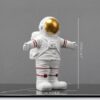 figurine astronaute jouet or